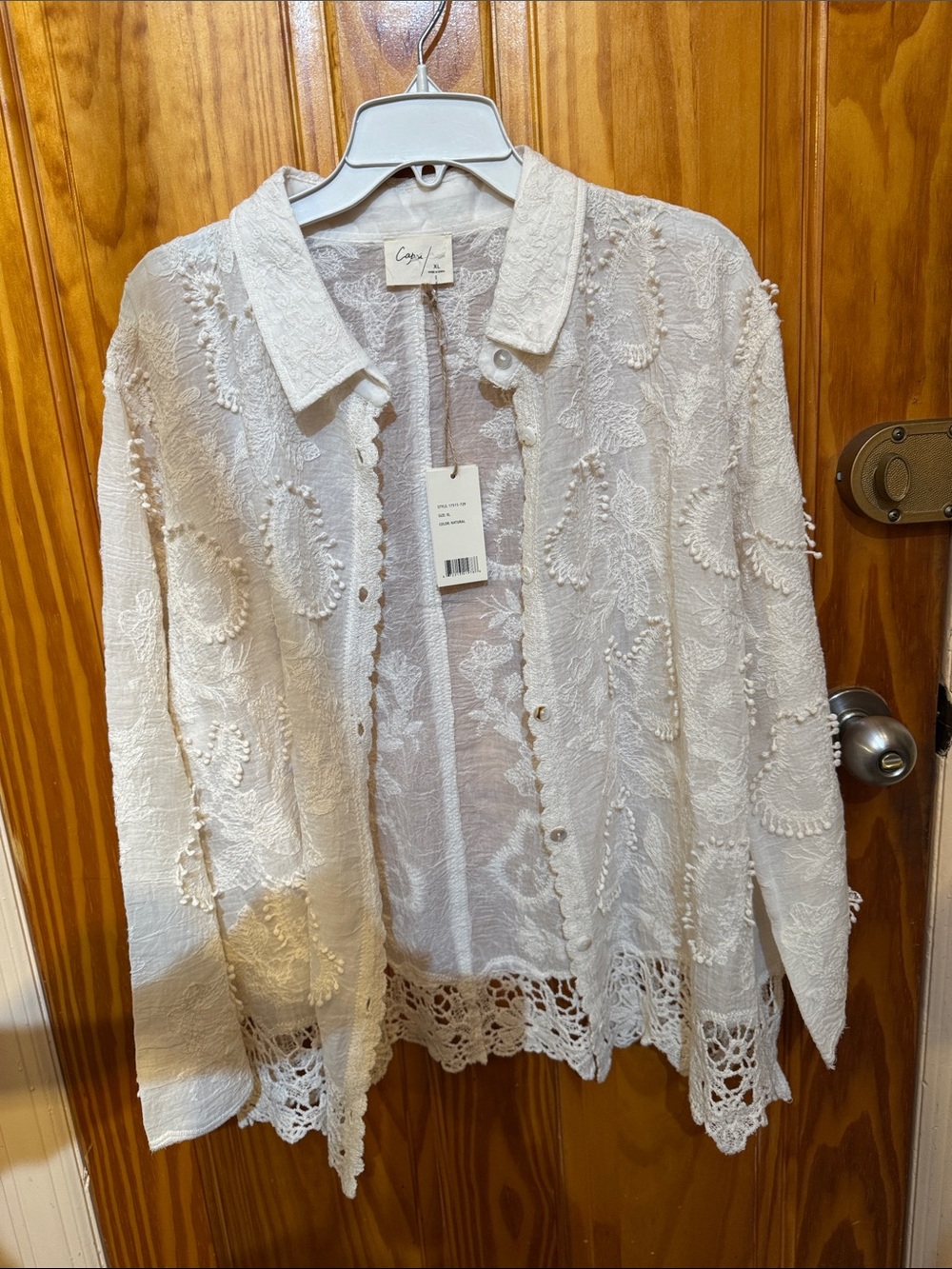 Cream Lace Button-Up Blouse with Crocheted Hem. 100% cotton